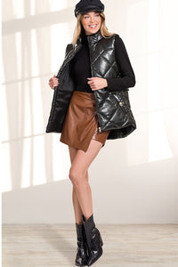 Free flying faux leather quilted vest